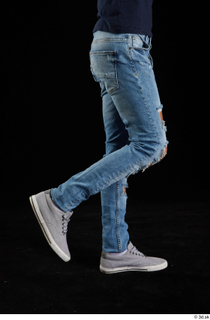 Claudio  1 blue jeans calf clothing flexing grey sneakers…